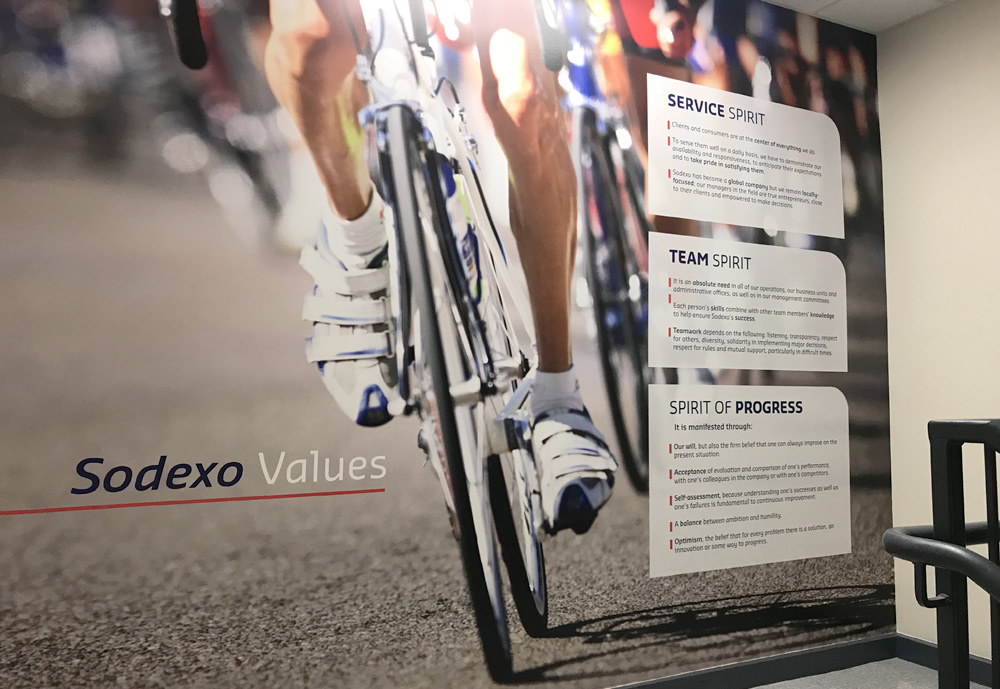 Sodexo values on Tour de France image. Sodexo has performed logistics and dining solutions for the tour for many years.